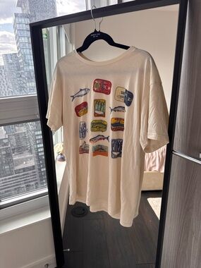 Cream Graphic T-Shirt with Colorful Can and Fish Prints